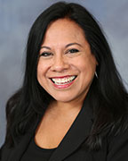 A portrait of a staff member